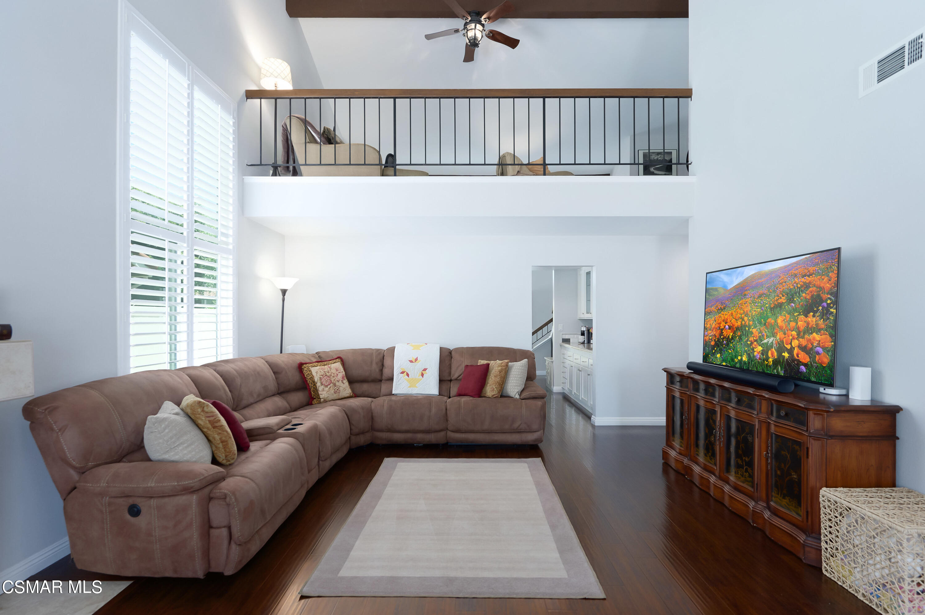 4798 Talmadge Road Moorpark, CA 93021 - Photo 11 of 65 a living room with furniture and a flat screen tv