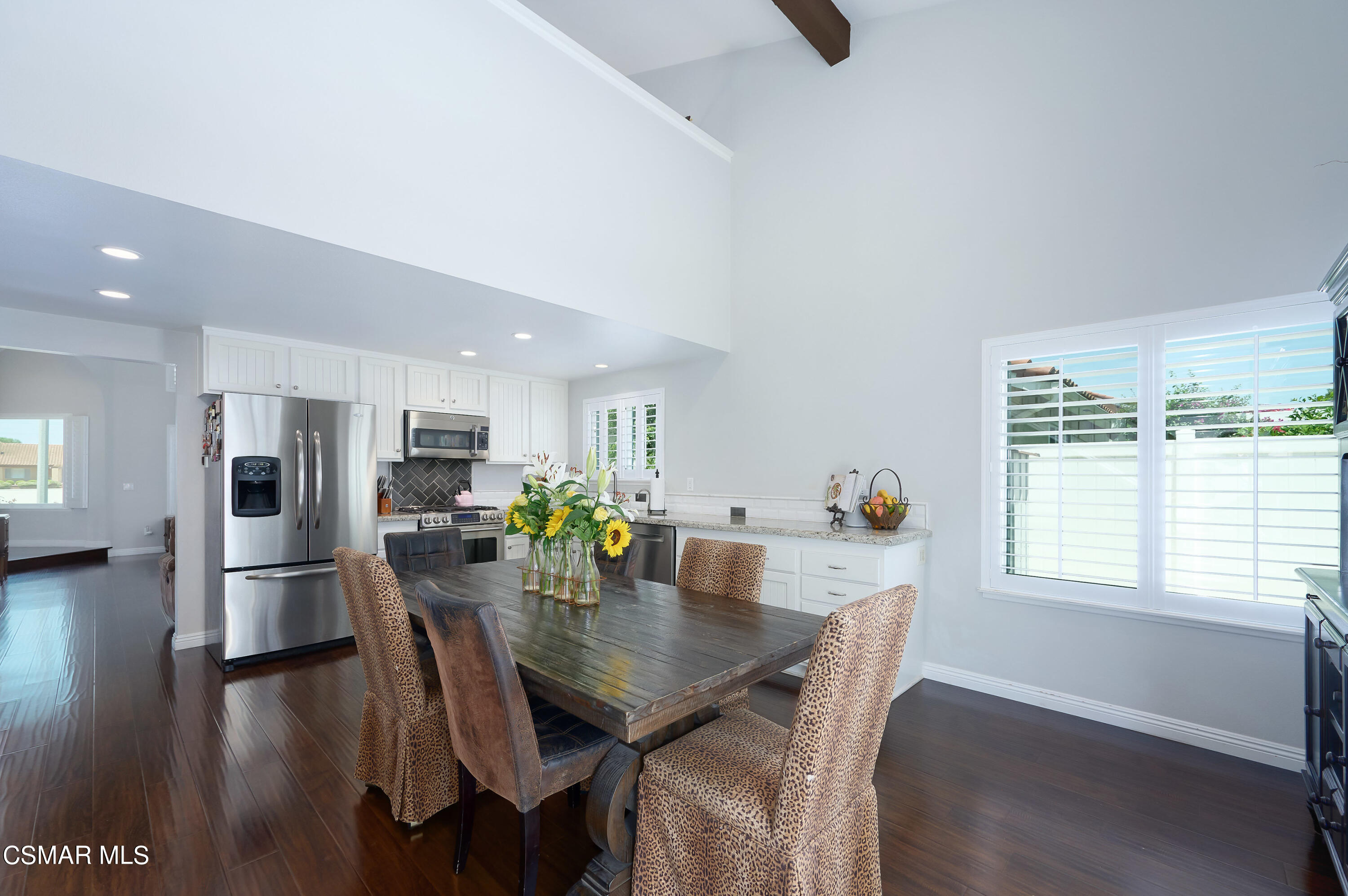 4798 Talmadge Road Moorpark, CA 93021 - Photo 16 of 65 a view of a dining room with furniture and wooden floor