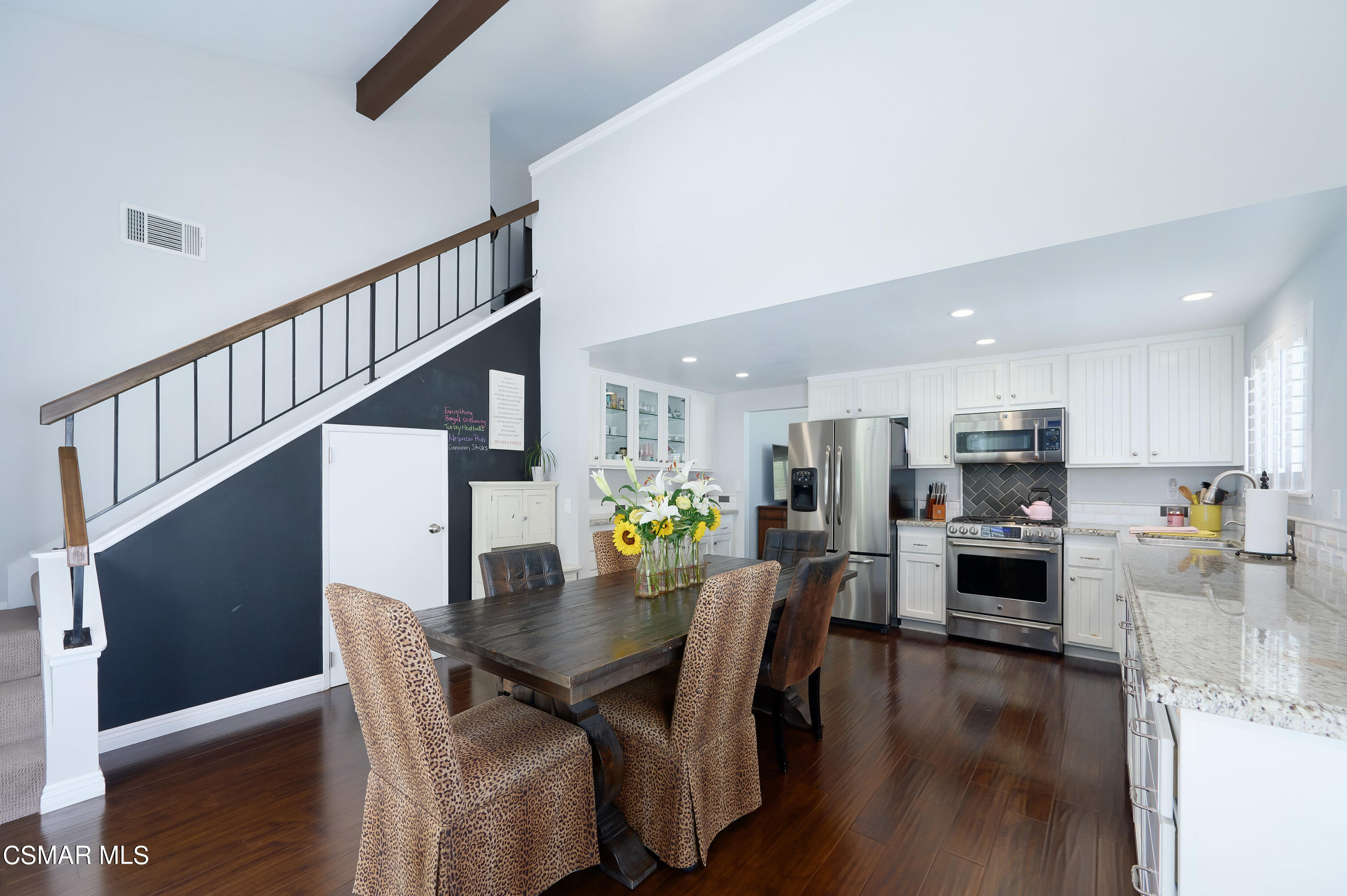4798 Talmadge Road Moorpark, CA 93021 - Photo 18 of 65 a view of a dining room with furniture and wooden floor