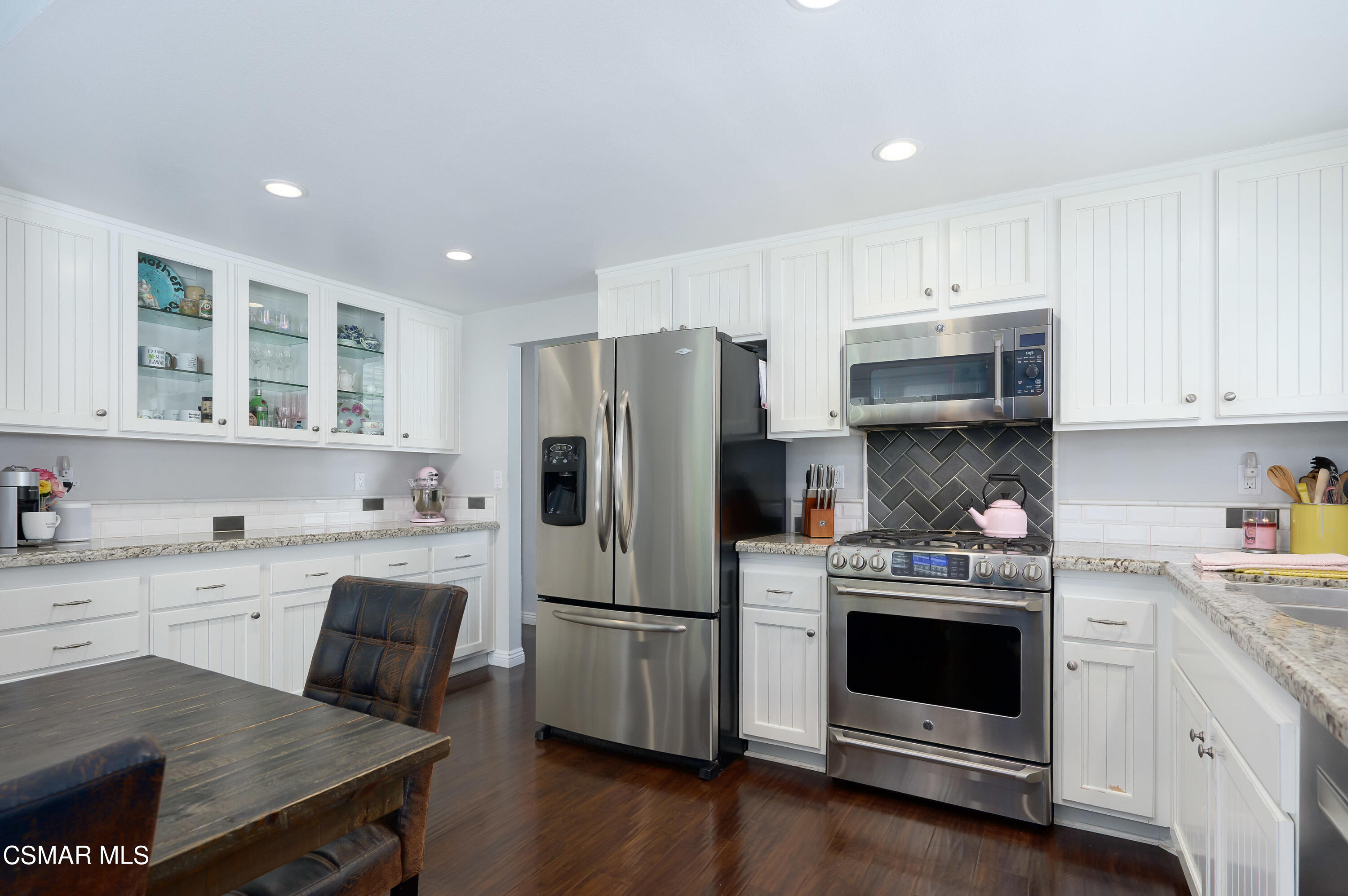 4798 Talmadge Road Moorpark, CA 93021 - Photo 19 of 65 a kitchen with a stove a sink and a refrigerator