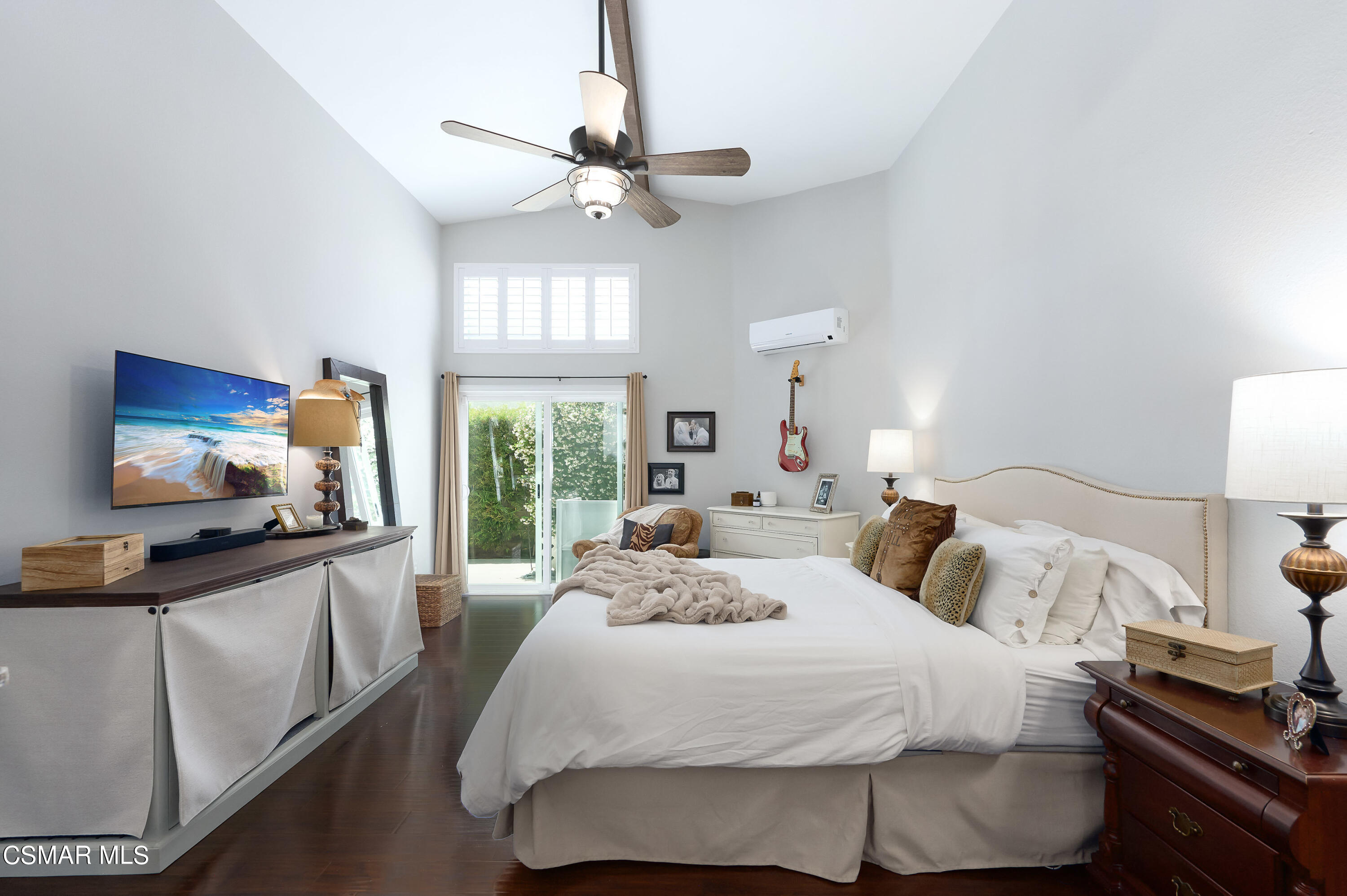 4798 Talmadge Road Moorpark, CA 93021 - Photo 28 of 65 a bedroom with a bed and a flat tv screen on dresser