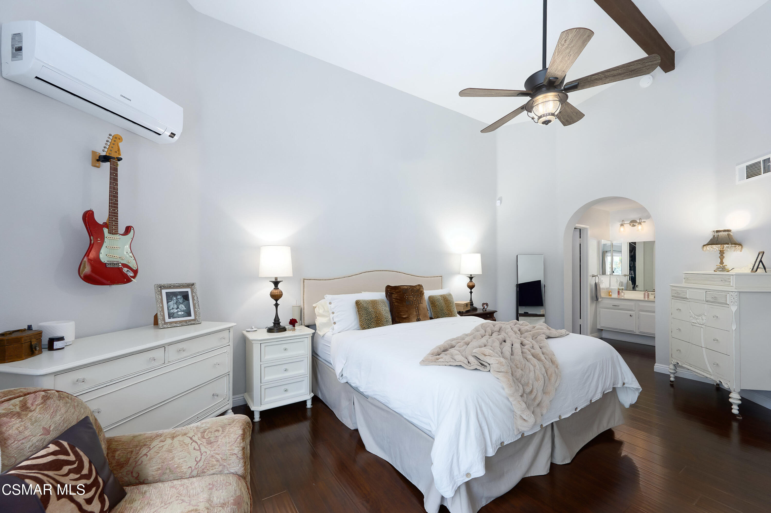 4798 Talmadge Road Moorpark, CA 93021 - Photo 30 of 65 a bedroom with a bed and a chandelier