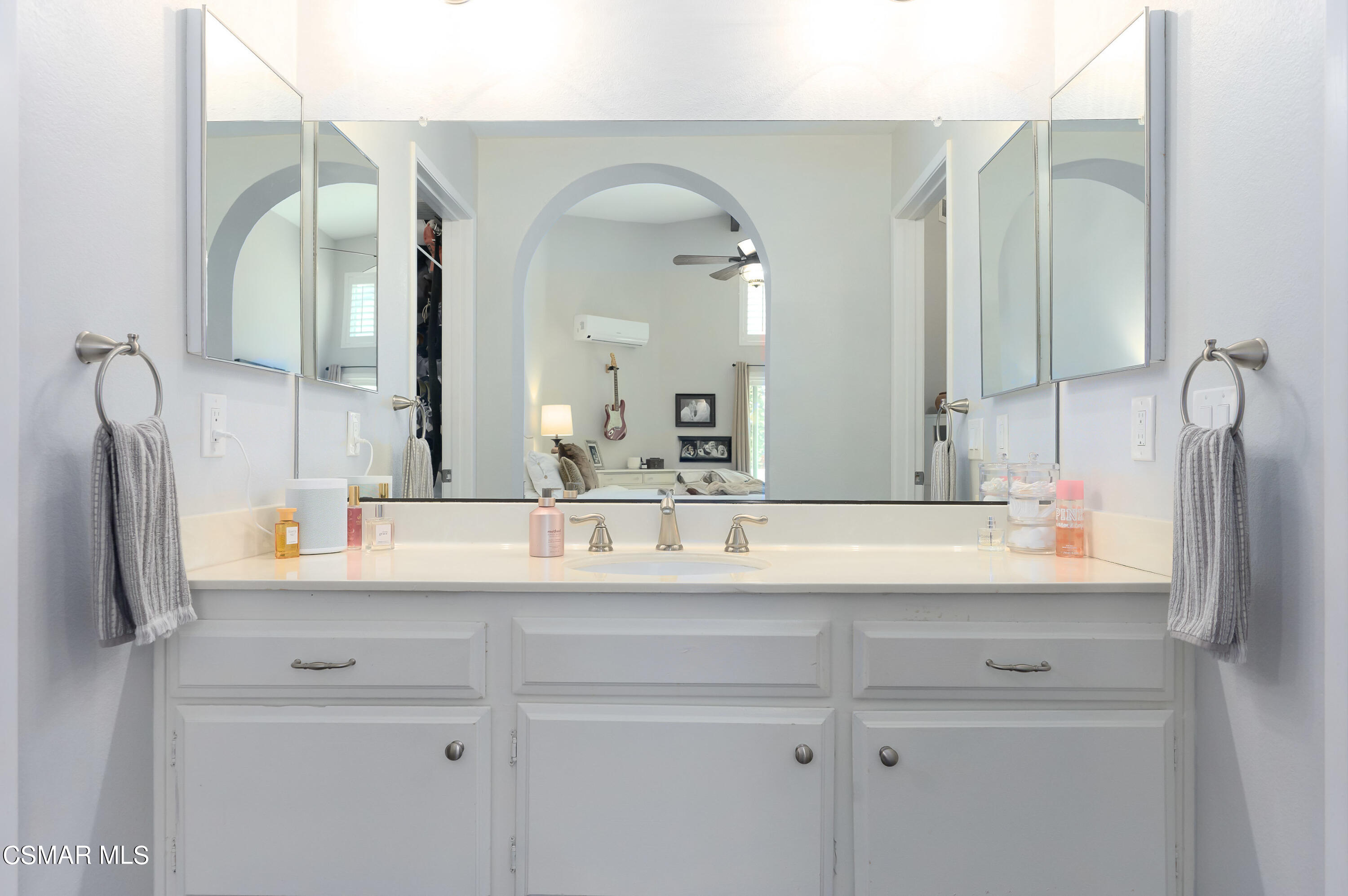4798 Talmadge Road Moorpark, CA 93021 - Photo 33 of 65 a bathroom with a sink and a mirror