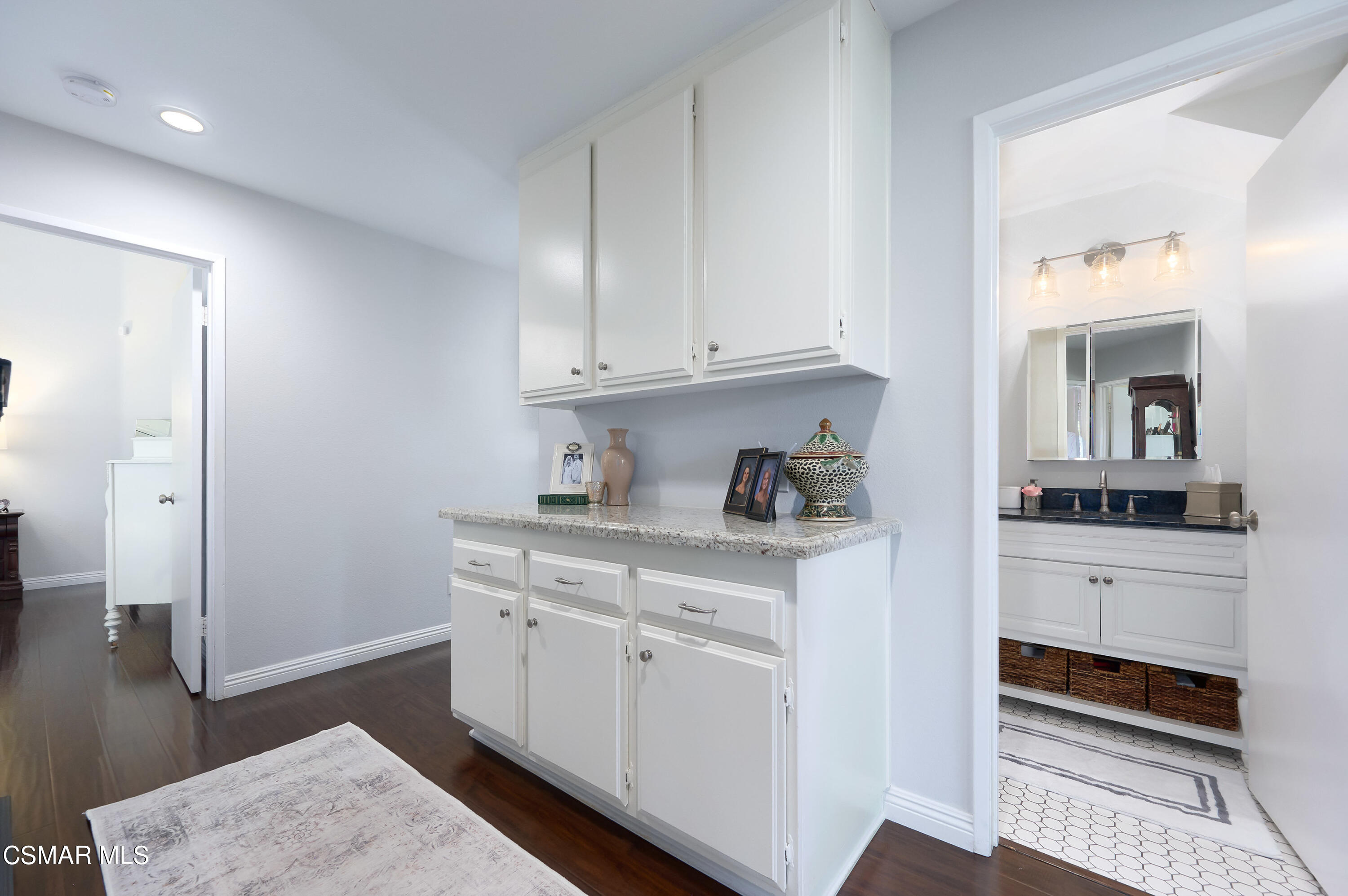 4798 Talmadge Road Moorpark, CA 93021 - Photo 36 of 65 a kitchen with white cabinets and sink