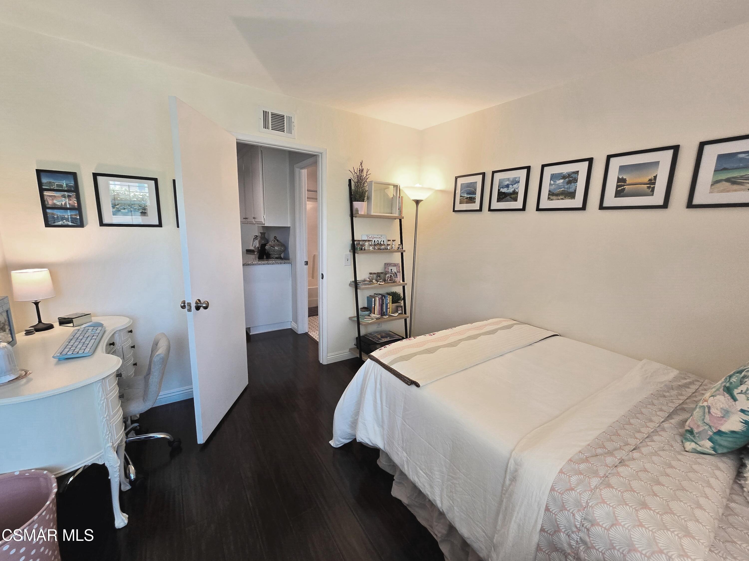 4798 Talmadge Road Moorpark, CA 93021 - Photo 46 of 65 a bedroom with a bed and a desk