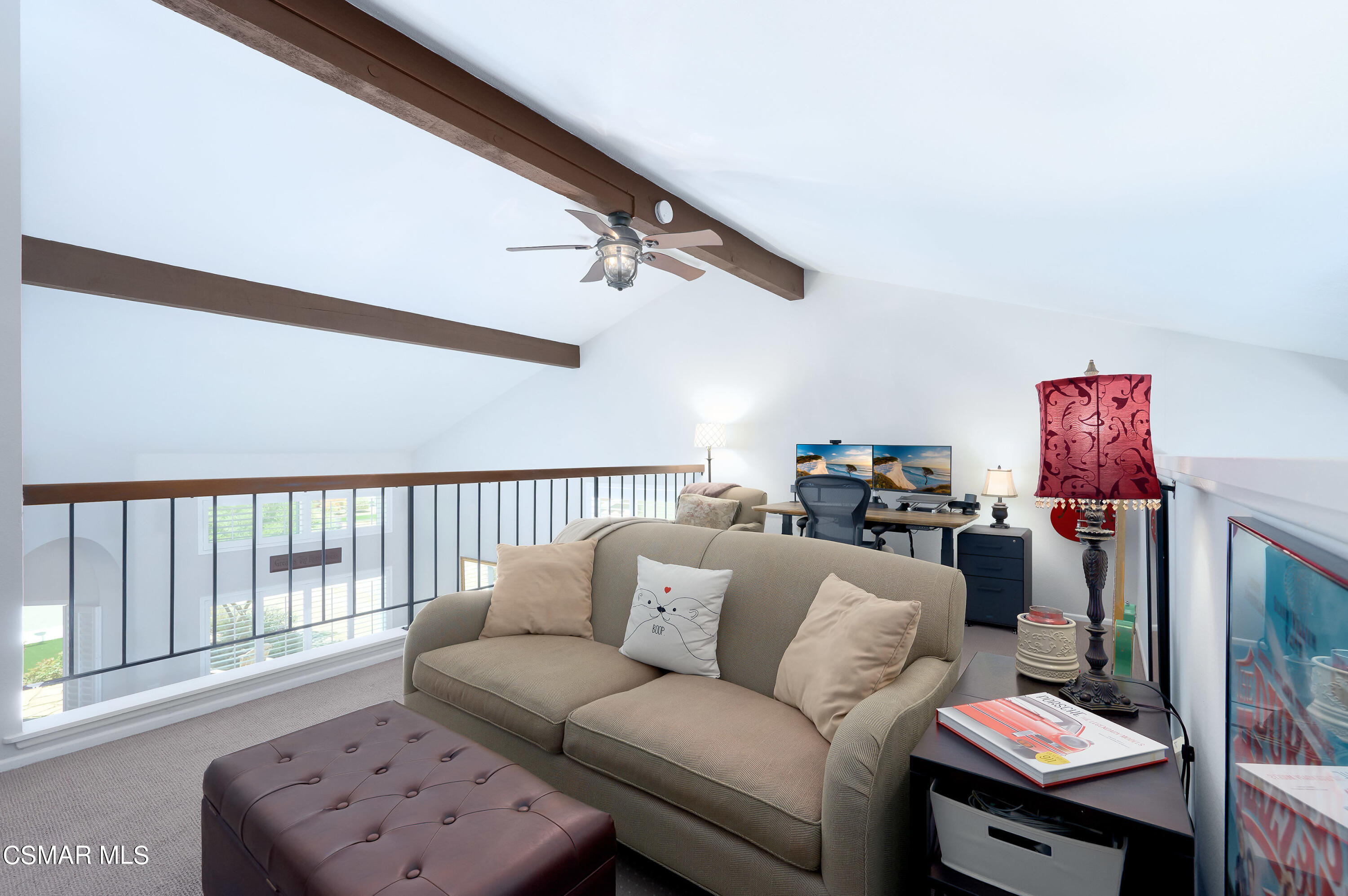 4798 Talmadge Road Moorpark, CA 93021 - Photo 48 of 65 a living room with furniture a rug and a window