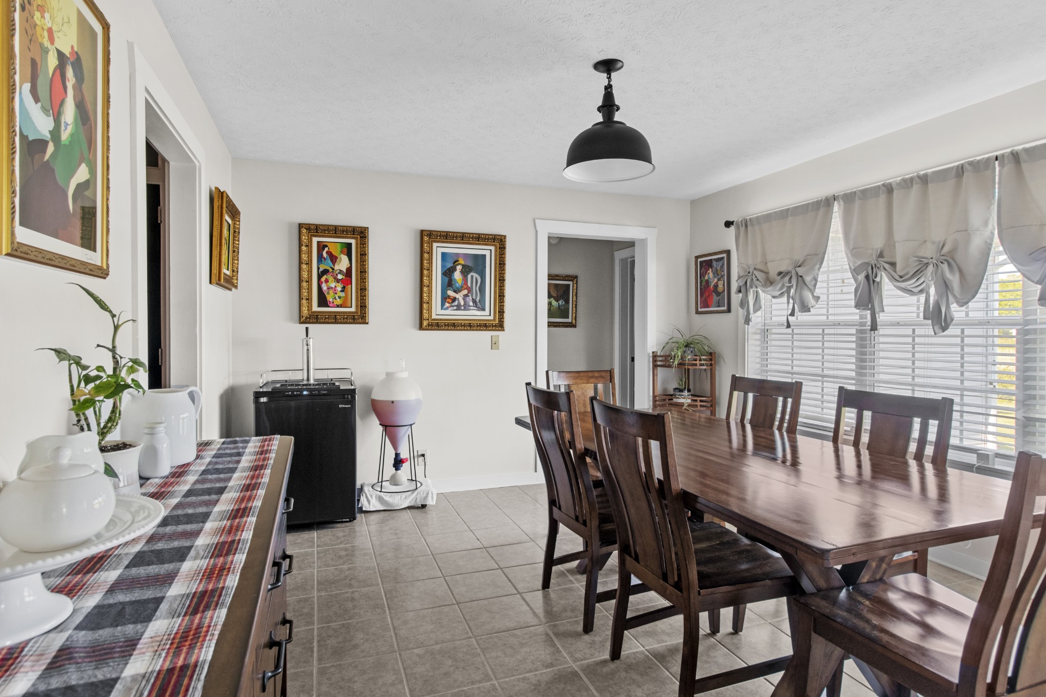884 Tidwell Road Burns, TN 37029 - Photo 11 of 28 a view of a dining room with furniture and chandelier