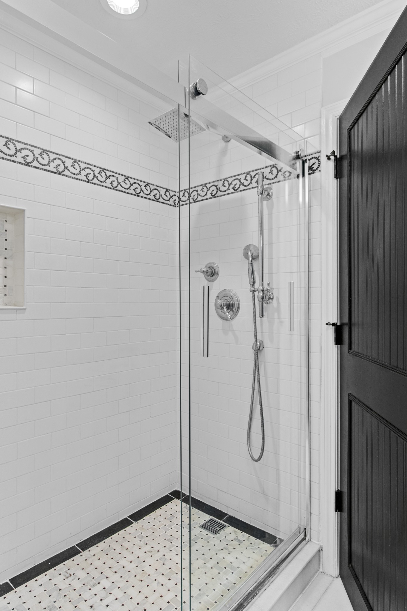 884 Tidwell Road Burns, TN 37029 - Photo 23 of 28 a bathroom with a glass shower door