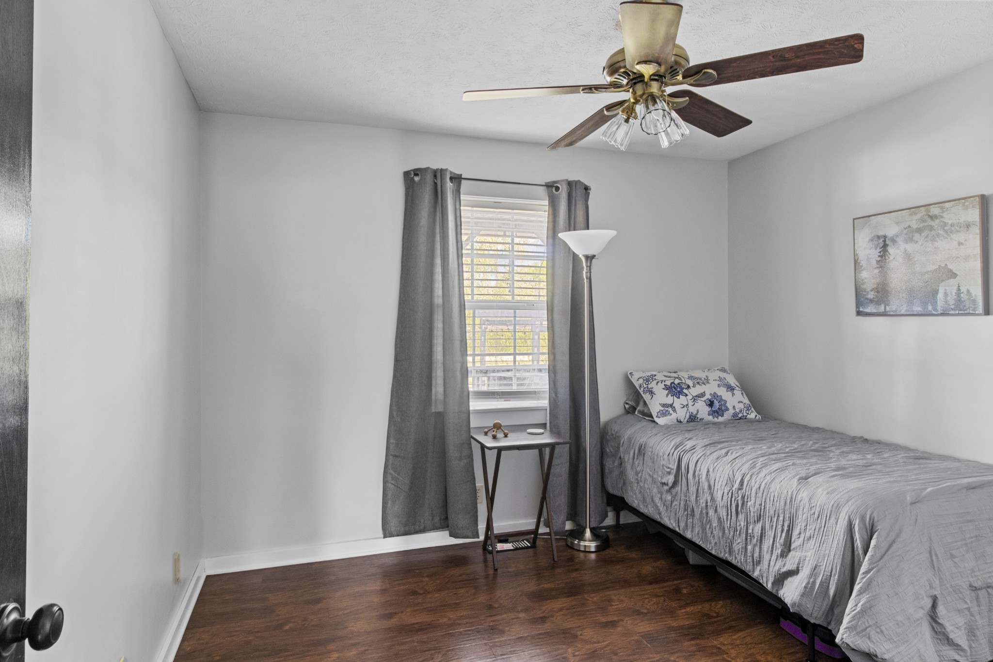 884 Tidwell Road Burns, TN 37029 - Photo 25 of 28 a bedroom with a bed and a window