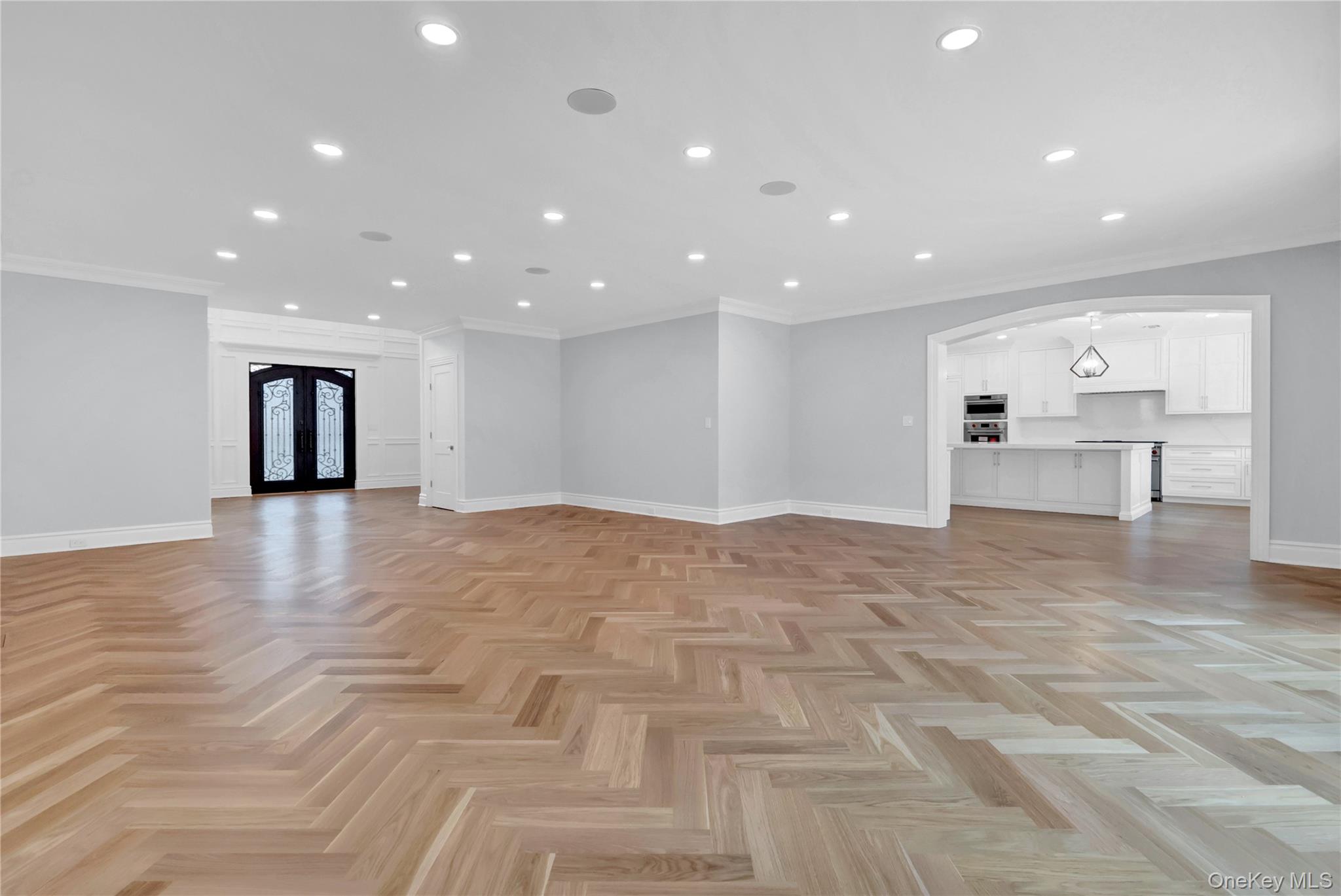541 Split Rock Road Syosset, NY 11791 - Photo 12 of 50 a view of empty room with kitchen and window