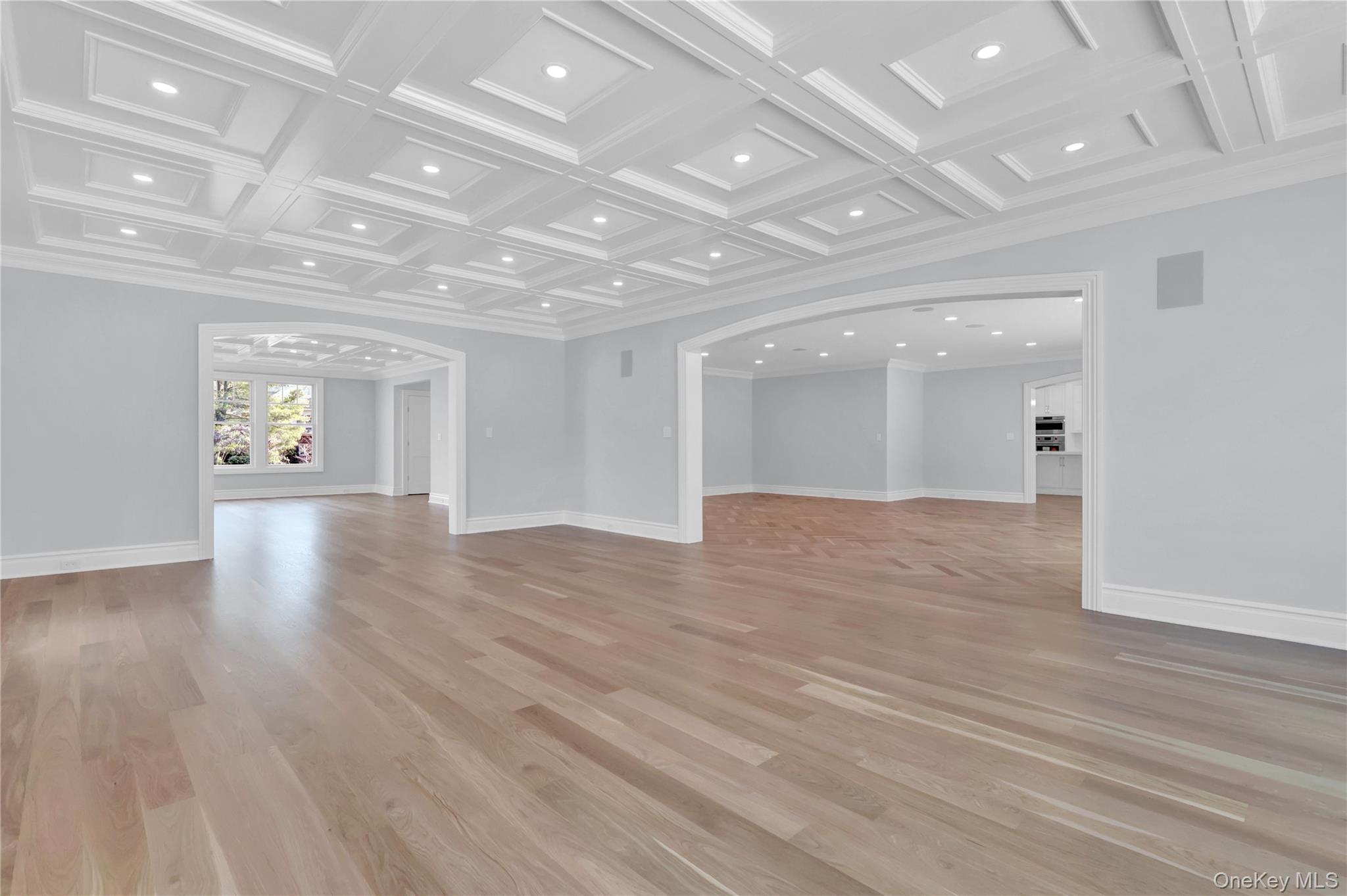 541 Split Rock Road Syosset, NY 11791 - Photo 19 of 50 an empty room with wooden floor and windows