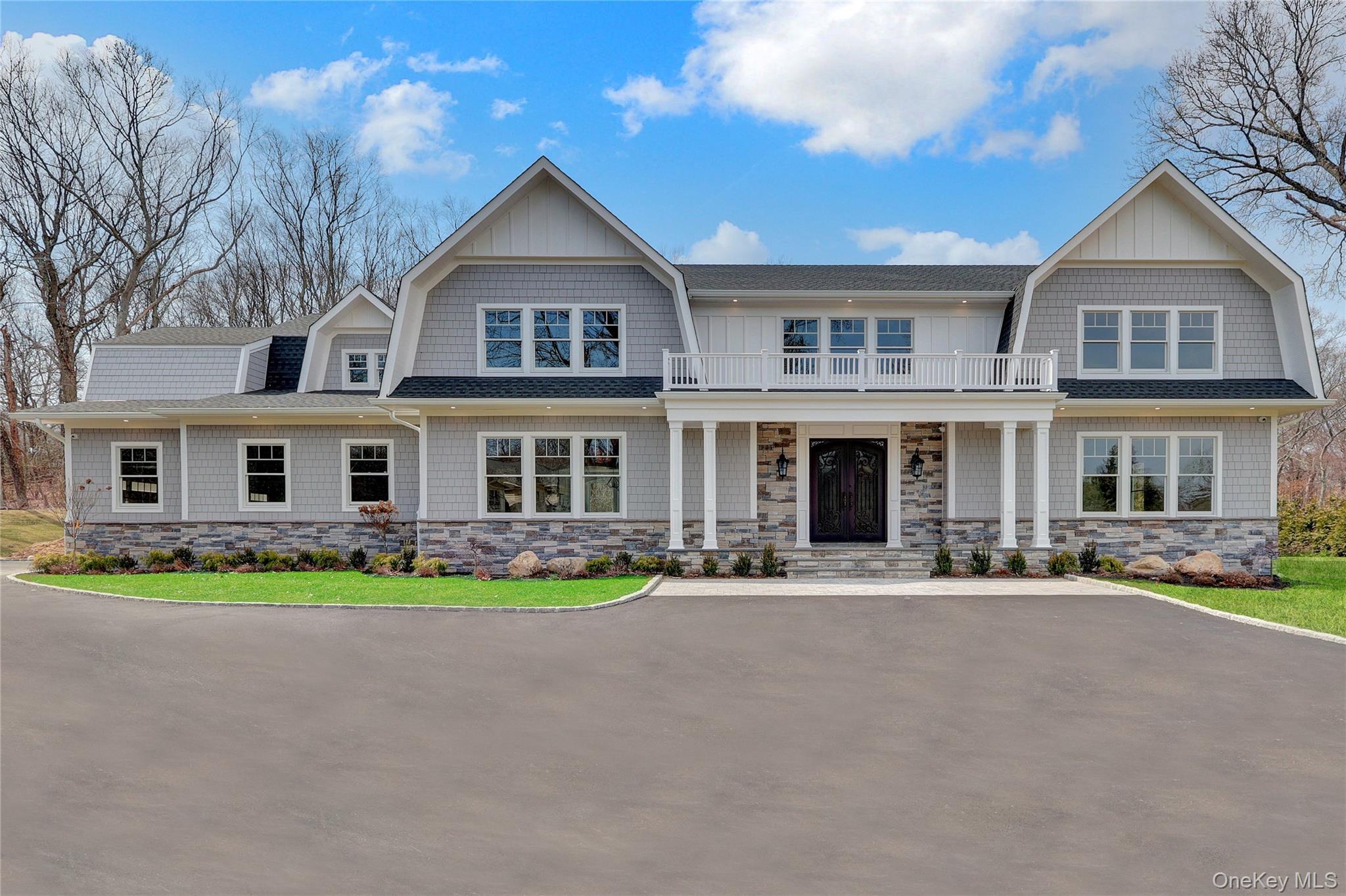 541 Split Rock Road Syosset, NY 11791 - Photo 2 of 50 a front view of a house with a yard