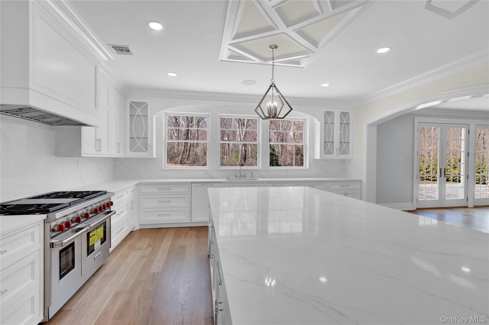 541 Split Rock Road Syosset, NY 11791 - Photo 25 of 50 a view of kitchen with sink and wooden floor