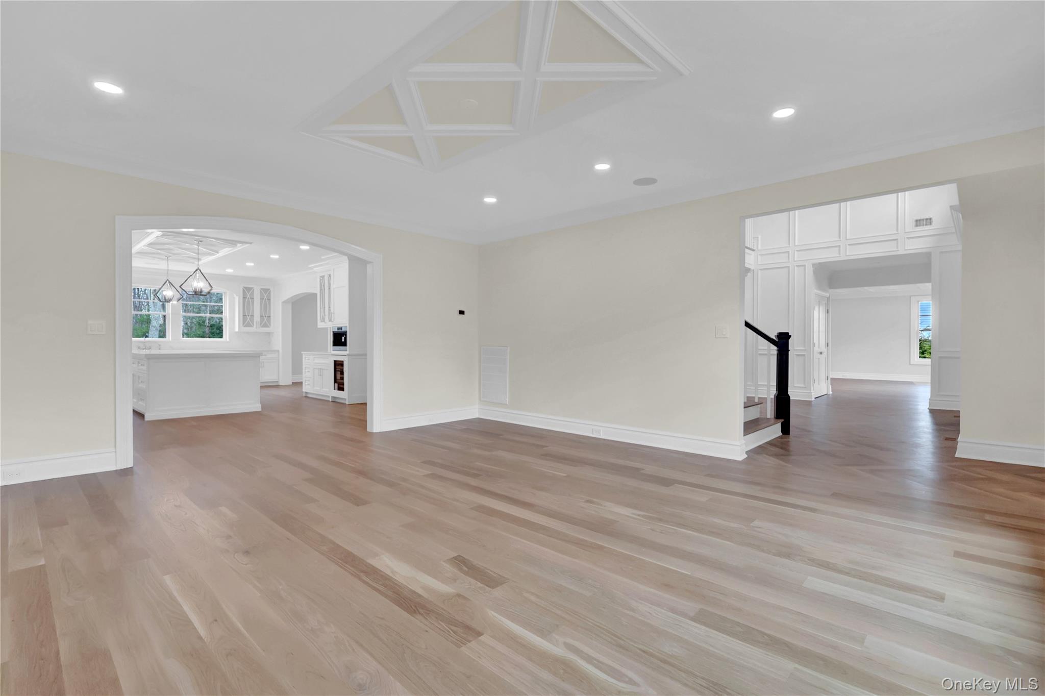 541 Split Rock Road Syosset, NY 11791 - Photo 26 of 50 a view of empty room with wooden floor and windows