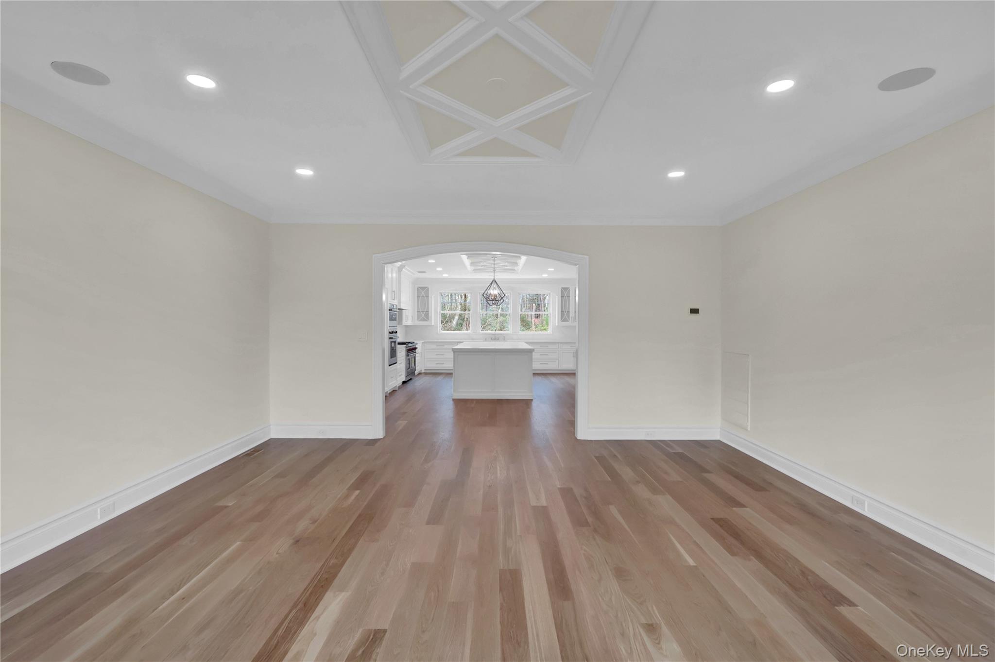 541 Split Rock Road Syosset, NY 11791 - Photo 28 of 50 wooden floor in an empty room with a window
