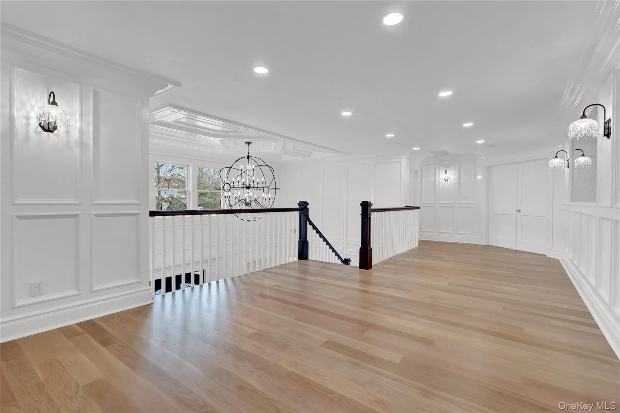 541 Split Rock Road Syosset, NY 11791 - Photo 30 of 50 a view of an empty room with wooden floor and a window