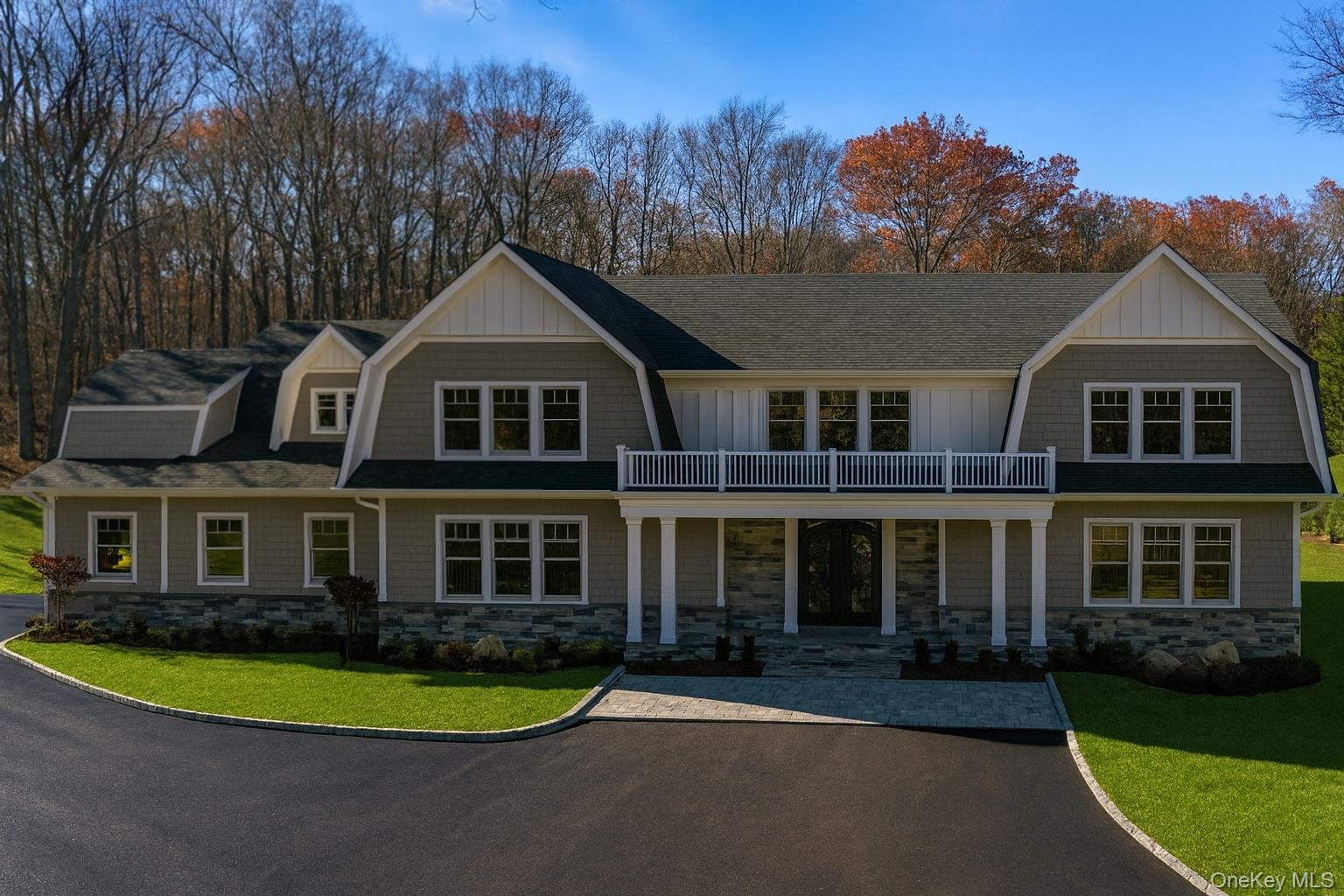 541 Split Rock Road Syosset, NY 11791 - Photo 3 of 50 front view of a house with a garden