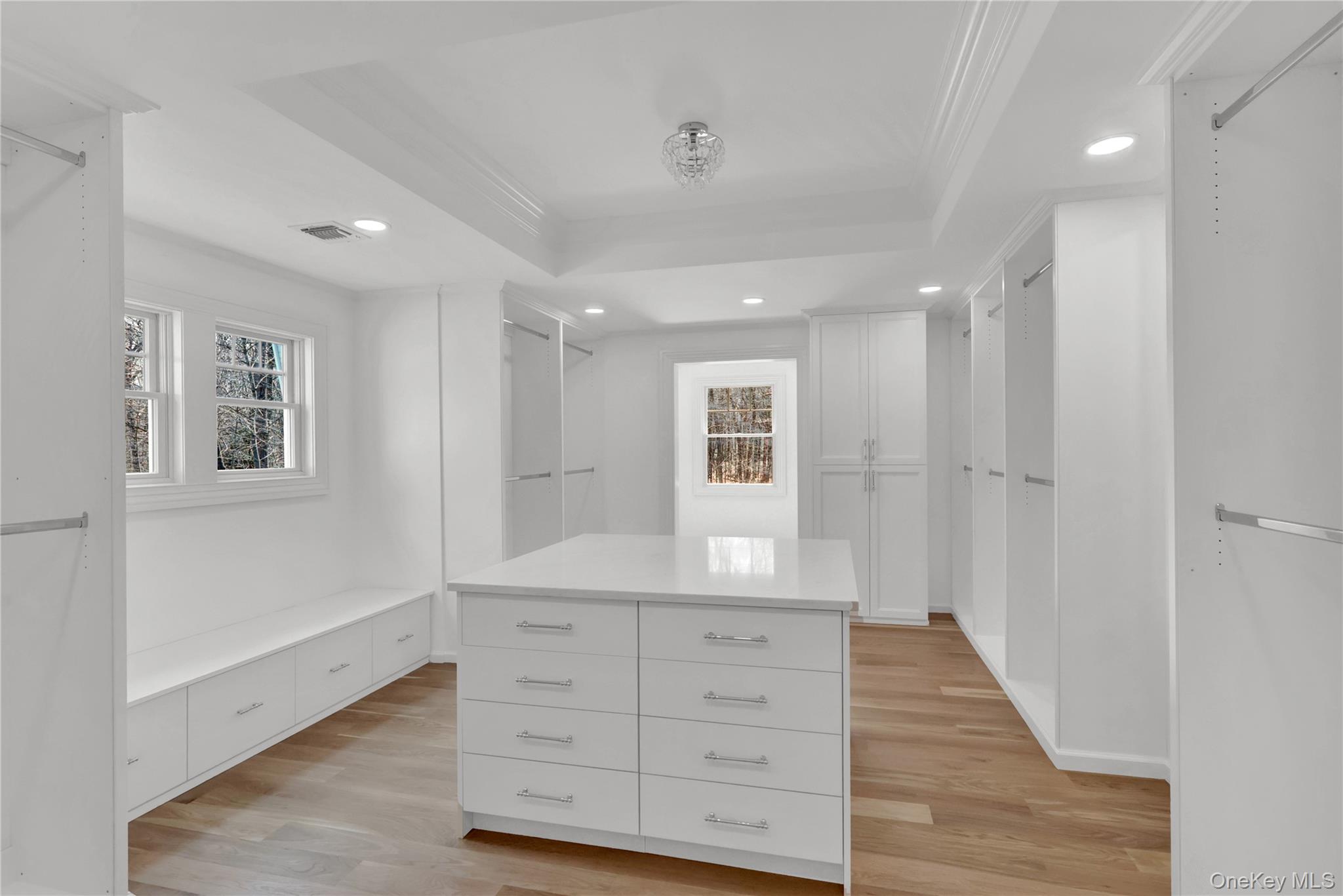 541 Split Rock Road Syosset, NY 11791 - Photo 35 of 50 a view of room with window and wooden floor