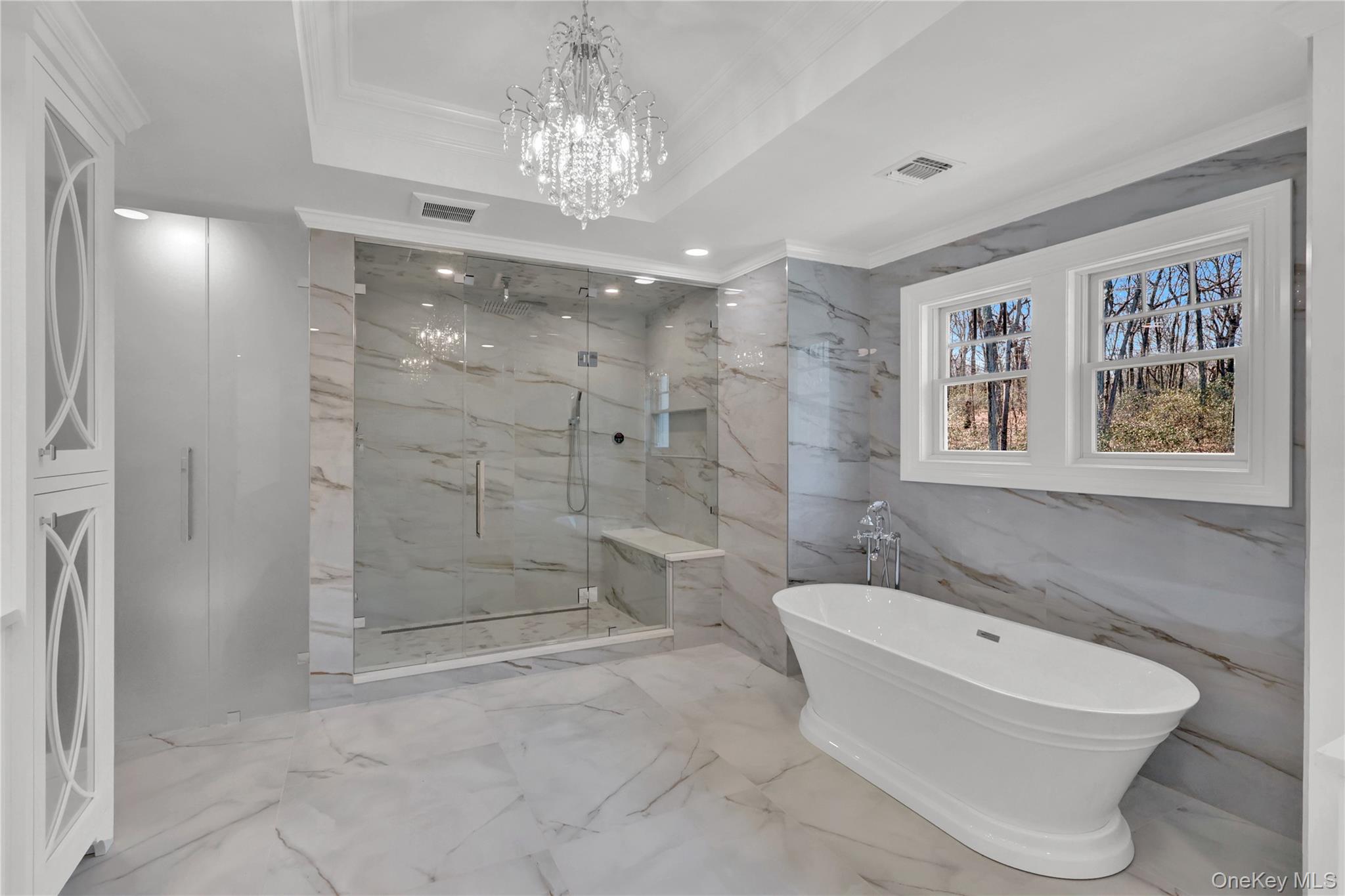 541 Split Rock Road Syosset, NY 11791 - Photo 37 of 50 a bathroom with a toilet sink and shower