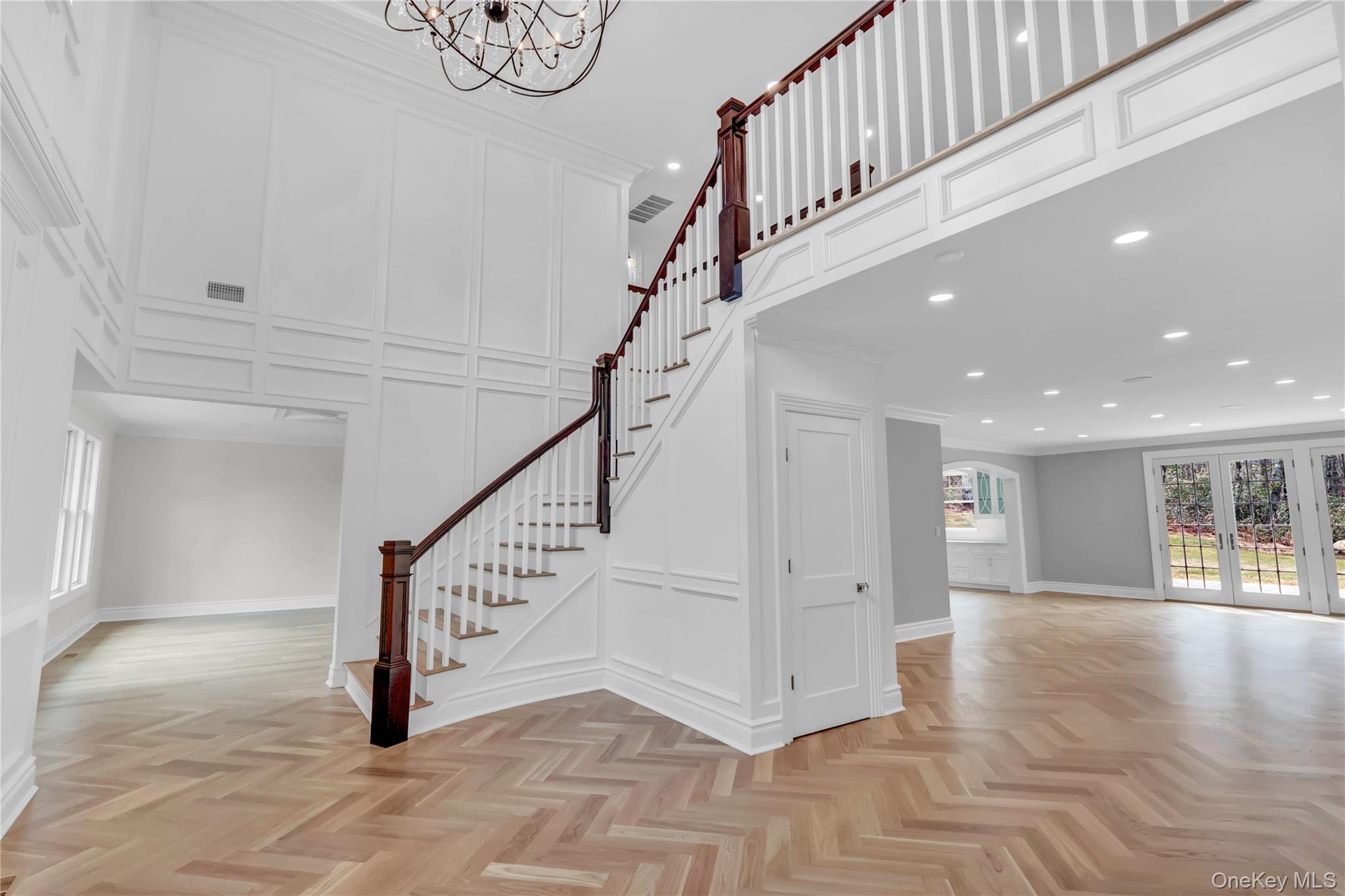 541 Split Rock Road Syosset, NY 11791 - Photo 9 of 50 a view of entryway and hall with wooden floor