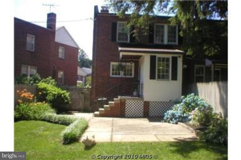6312 Blackburn Court Baltimore, MD 21212 - Photo 12 of 13 a front view of a house with a yard