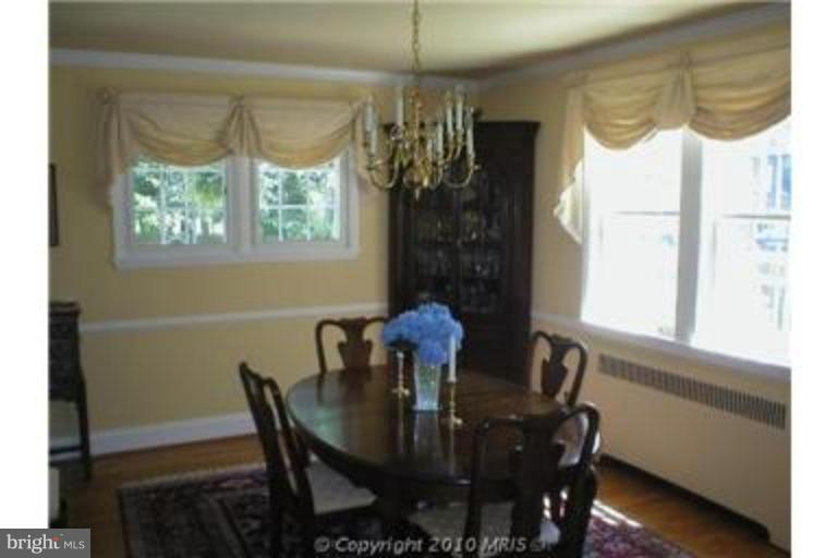 6312 Blackburn Court Baltimore, MD 21212 - Photo 4 of 13 a view of a dining room with furniture window and outside view