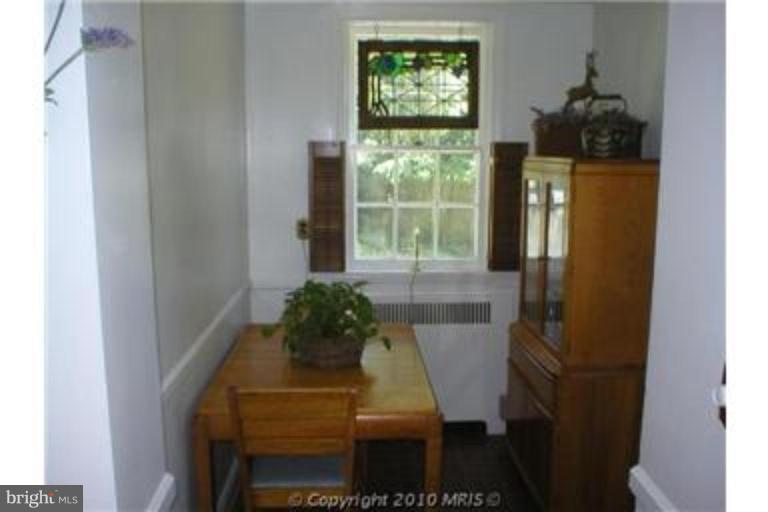 6312 Blackburn Court Baltimore, MD 21212 - Photo 6 of 13 a room with a window and furniture