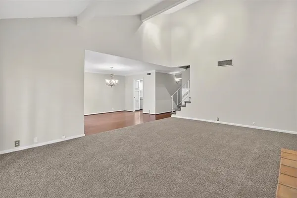 a kitchen with stainless steel appliances granite countertop a sink and a stove