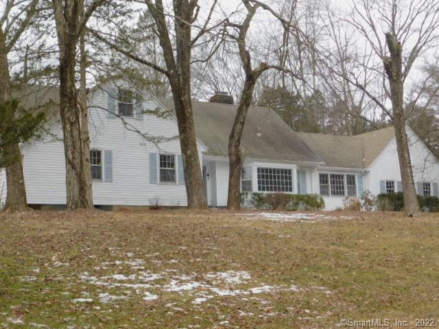 65 Ridgecrest Road Stamford, CT 06903 - Photo 1 of 1 a view of a yard in front of a house with large trees