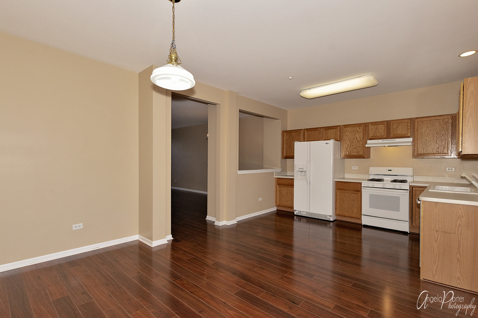 707 Prestwick Lane Wheeling, IL 60090 - Photo 16 of 29 a view of a kitchen with stainless steel appliances a refrigerator and a stove top oven