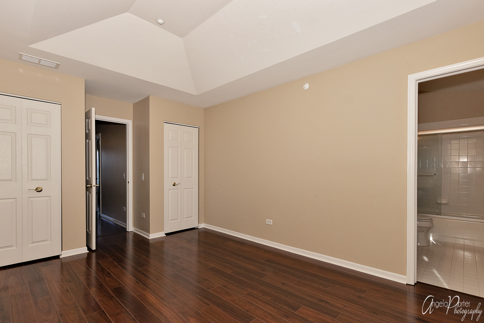 707 Prestwick Lane Wheeling, IL 60090 - Photo 23 of 29 a view of an empty room with wooden floor and closet