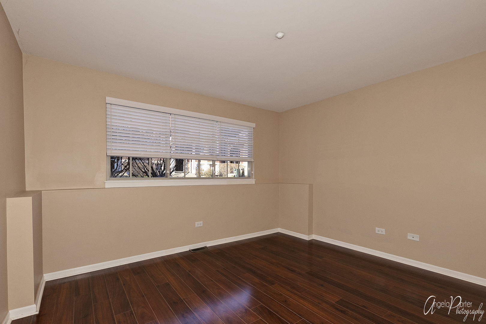 707 Prestwick Lane Wheeling, IL 60090 - Photo 27 of 29 a view of a room with wooden floor