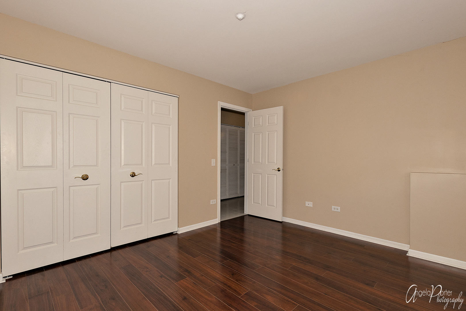 707 Prestwick Lane Wheeling, IL 60090 - Photo 28 of 29 a view of an empty room with wooden floor