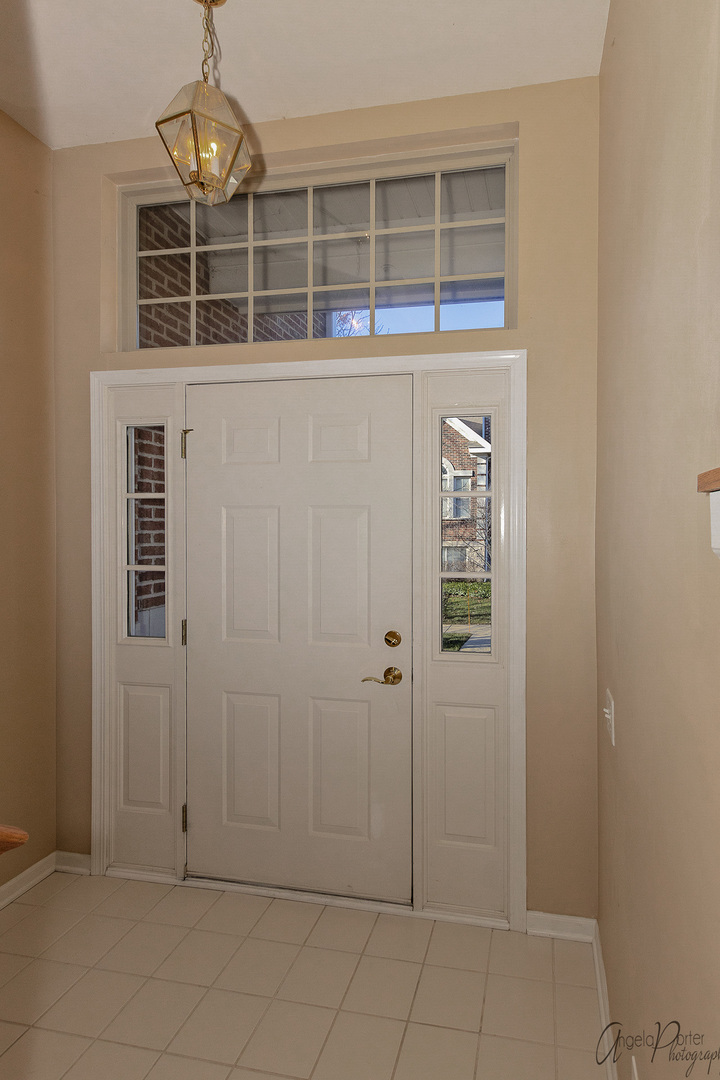 707 Prestwick Lane Wheeling, IL 60090 - Photo 6 of 29 view of an empty room with a window