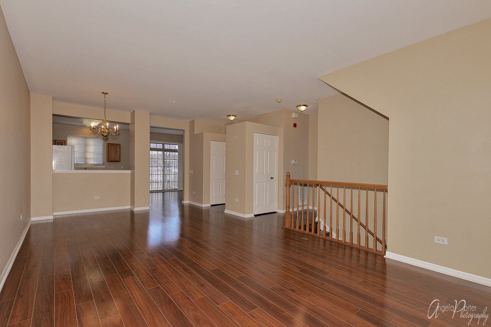 707 Prestwick Lane Wheeling, IL 60090 - Photo 9 of 29 a view of an empty room with wooden floor
