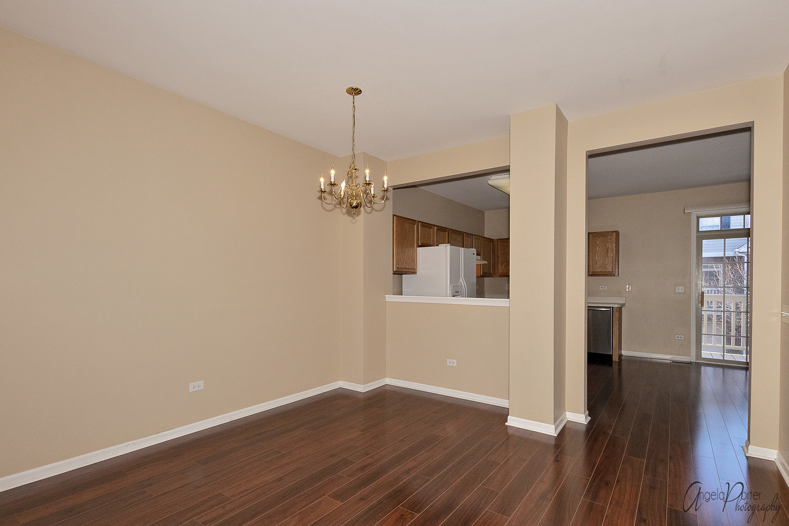 707 Prestwick Lane Wheeling, IL 60090 - Photo 10 of 29 a view of a room with wooden floor
