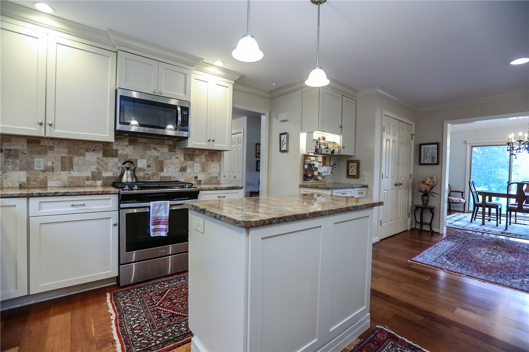 35 Shadow Pines Drive Penfield, NY 14526 - Photo 11 of 28 Kitchen with center island