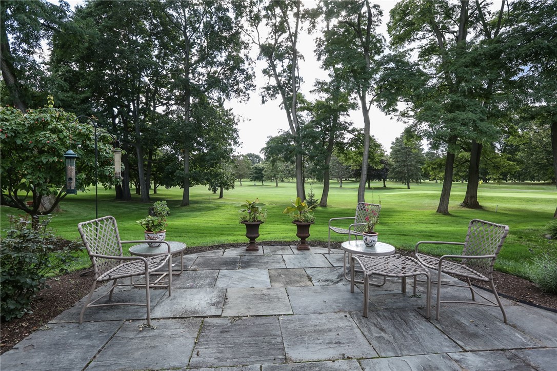 35 Shadow Pines Drive Penfield, NY 14526 - Photo 23 of 28 The slate patio offers spectacular views of the 6t
