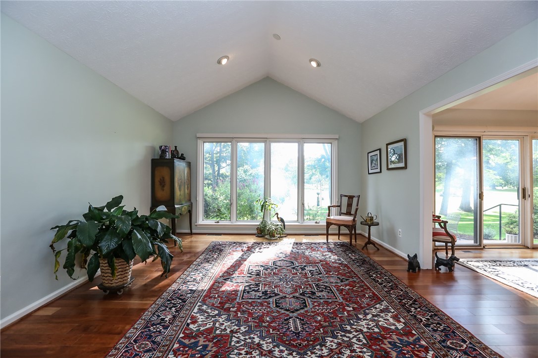 35 Shadow Pines Drive Penfield, NY 14526 - Photo 4 of 28 Living room, with cathedral ceiling & golf course