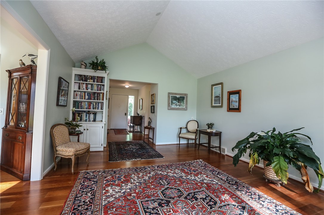 35 Shadow Pines Drive Penfield, NY 14526 - Photo 5 of 28 Living room, with built-in shelving