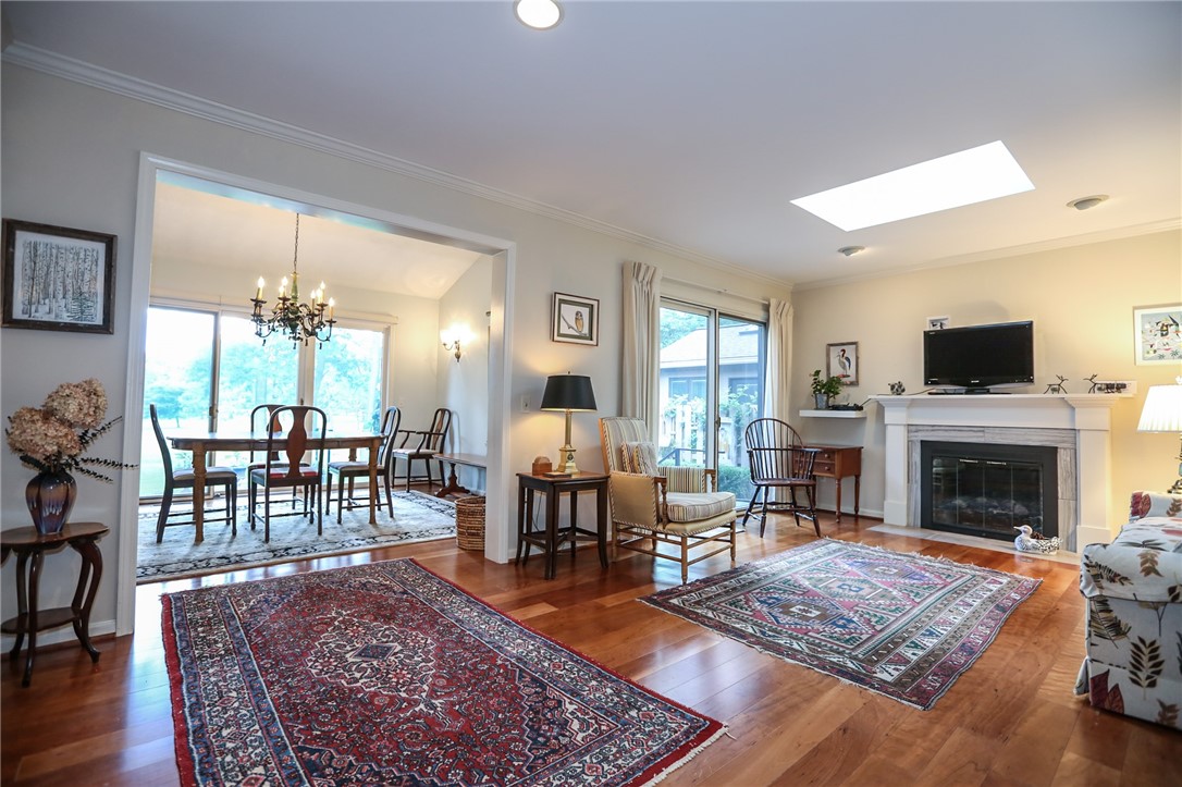 35 Shadow Pines Drive Penfield, NY 14526 - Photo 9 of 28 The skylight & sliding glass doors allow for plent