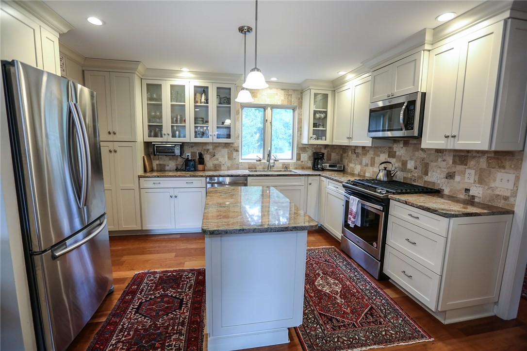 35 Shadow Pines Drive Penfield, NY 14526 - Photo 10 of 28 Updated Kitchen with granite counters