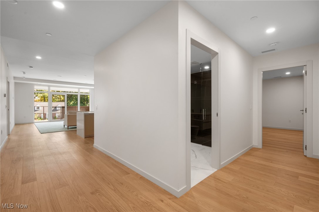 22700 Lake Road, Unit 204 Rocky River, OH 44116 - Photo 2 of 31 Hall featuring recessed lighting and light wood finished floors