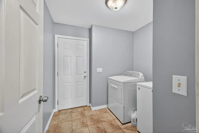 a view of a swimming pool with an outdoor space and seating area