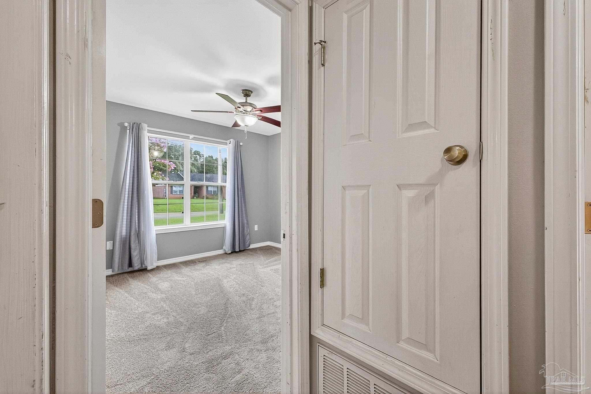 5053 Copperfield Drive Pace, FL 32571 - Photo 10 of 52 a view of a room with an entryway