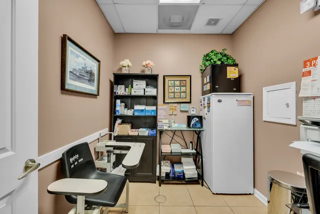 a view of a workspace with furniture