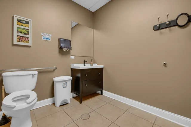 a workspace with furniture and wooden floor