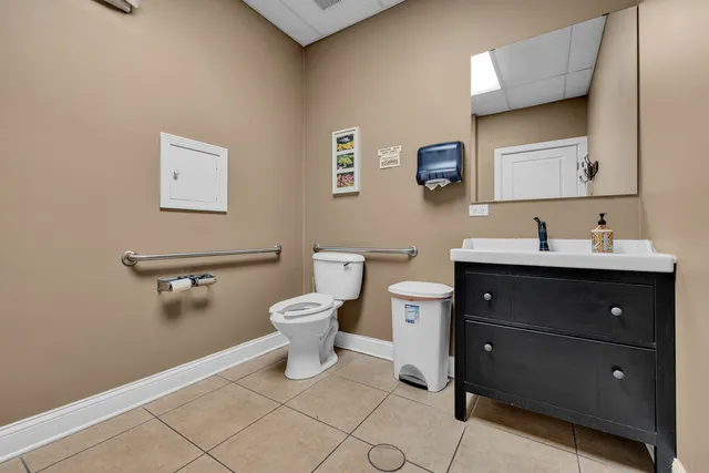 a workspace with furniture and a window