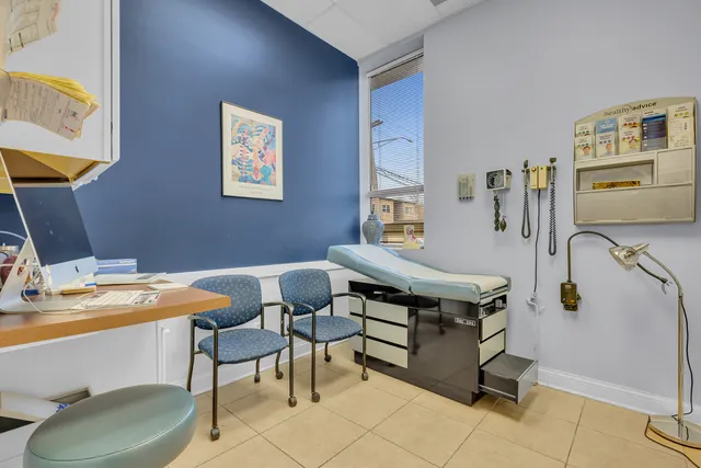 a view of a car park in front of a building