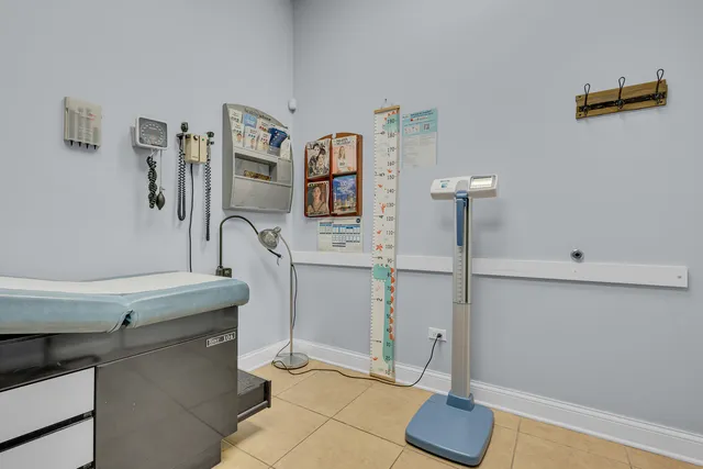 a view of a brick house with a door